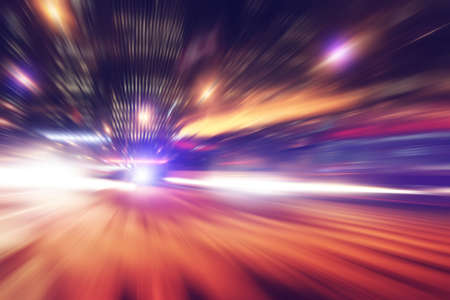 Abstract image of night lights with motion blur in the city.の写真素材