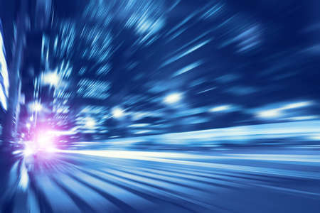 Toned image of night lights with motion blur in the city.の写真素材