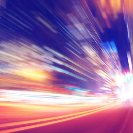 Abstract image of night lights with motion blur in the city.の写真素材