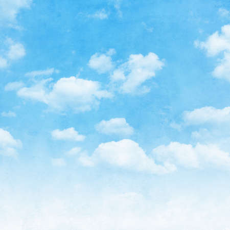 Blue sky with white clouds in grunge style.の写真素材