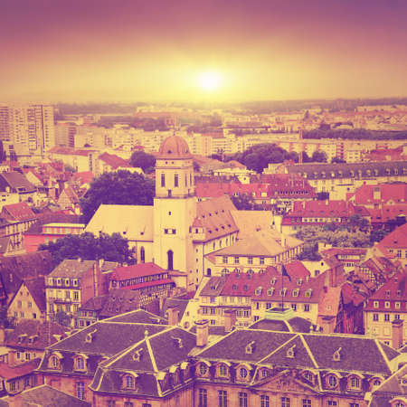 Aerial view of medieval house roofs in Strasbourg at sunset.の写真素材