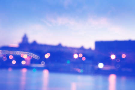 Abstract blurred cityscape background with bokeh effect.の写真素材