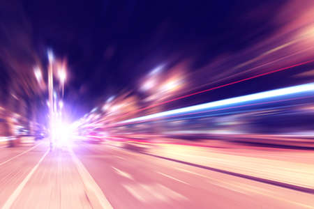 Abstract image of traffic lights in motion blur in the city.の写真素材