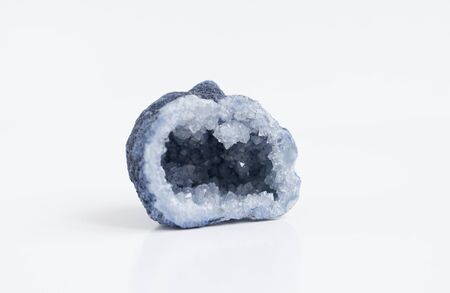 Close up photo mineralogy and esotericism. Blue quartz druse or geode mineral stone.