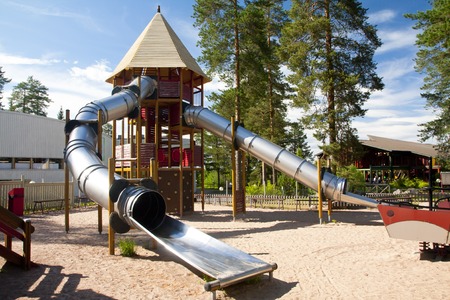 A children's playground with a slideのeditorial素材