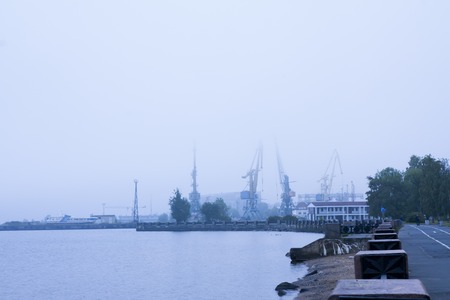 Petrozavodsk, Russia - 07 September 2015: Harbor of Petrozavodsk and shipyard in fog, top viewのeditorial素材