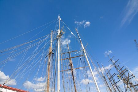 Masts of sailboat at the blue sky background. THE TALL SHIPS RACES KOTKA 2017. Kotka, Finland 16.07.2017.のeditorial素材