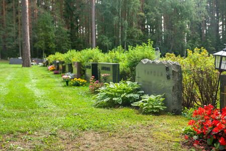Cemetery with gravestones and flowers in Finlandのeditorial素材