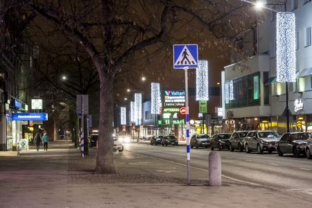 KOUVOLA, FINLAND - NOVEMBER 28, 2018: Christmas decorations in the streets of Kouvola with evening light illumination, concept of Christmas in Finland. Long exposure photoのeditorial素材