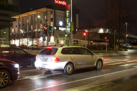 KOUVOLA, FINLAND - NOVEMBER 8, 2018: Long exposure photo. Night traffic on streets of Kouvola, Finlandのeditorial素材