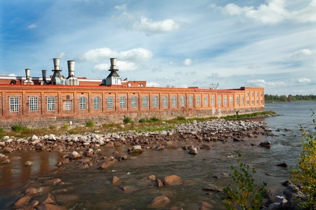 KOUVOLA, FINLAND - SEPTEMBER 20, 2018: Hydroelectric power generation plant and Ankkapurha Industrial Museum at Kymijoki river, Finland.のeditorial素材
