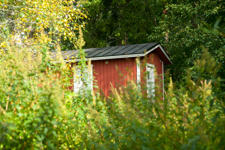 KOUVOLA, FINLAND - SEPTEMBER 20, 2018: Beautiful red old wooden house on the territory of Anjala manorのeditorial素材