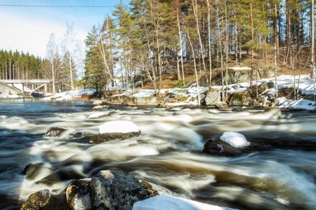 Long exposure photo. Dam and threshold on the river Jokelanjoki, Kouvola, Finlandの写真素材