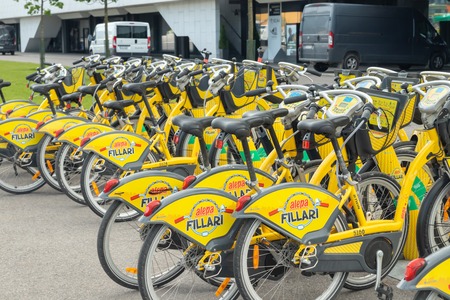 Helsinki, Finland - June 12, 2019: Yellow city bicycles for rent stand in a row in central part of Helsinkiのeditorial素材