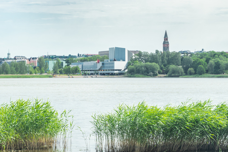 Helsinki, Finland - June 12, 2019: Toolo bay in the City Park in Helsinki, Finlandia Hall congress and event venue can be seen across the waterのeditorial素材