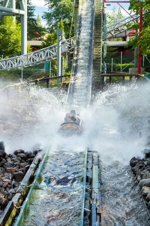Fun water ride Log river in amusement park at summerの写真素材