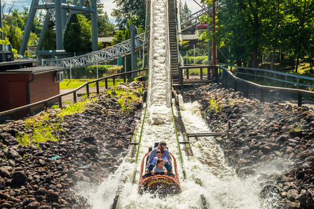Tampere, Finland - 24 June 2019: Fun water ride Log river in amusement park Sarkanniemi at summerのeditorial素材