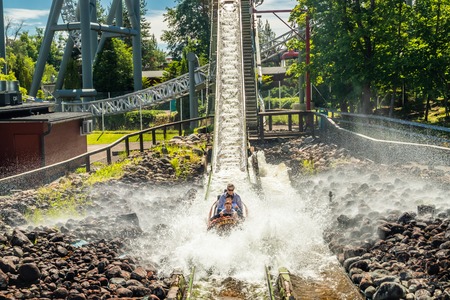Tampere, Finland - 24 June 2019: Fun water ride Log river in amusement park Sarkanniemi at summerのeditorial素材