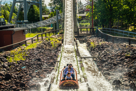 Tampere, Finland - 24 June 2019: Fun water ride Log river in amusement park Sarkanniemi at summerのeditorial素材
