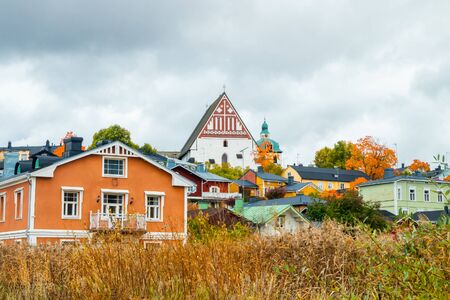 View of old Porvoo, Finland. Beautiful city autumn landscape with Porvoo Cathedral and colorful wooden buildings.の写真素材
