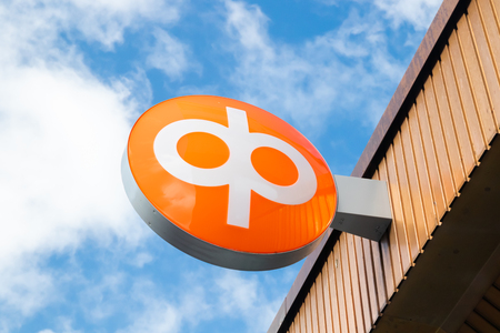 Kouvola, Finland - 22 September, 2019: OP-Pohjola Group bank sign on the wall of bank office.のeditorial素材