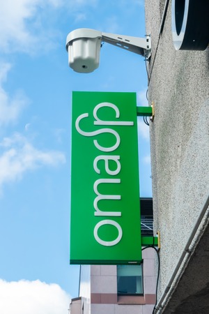 Kouvola, Finland - 22 September, 2019: Oma Saastopankki bank sign on the wall of bank office.のeditorial素材