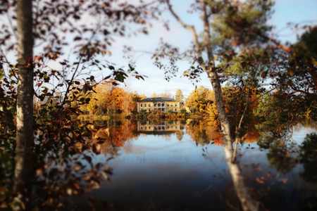 Kouvola, Finland - 8 October 2019: Autumn landscape with beautiful wooden Rabbelugn Manor - Takamaan...
