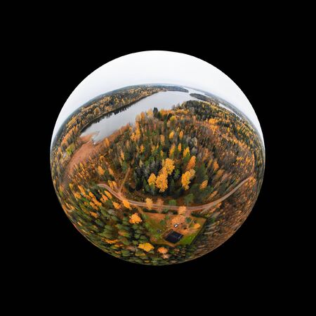 Aerial panoramic view in form of small planet of lake and colorful forests on a autumn day in Finland. Drone photographyの写真素材