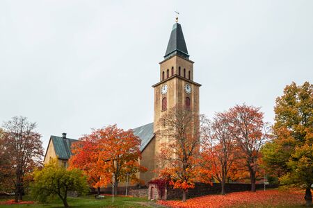 Kuusankoski church at beautiful autumn day, Finland.の写真素材