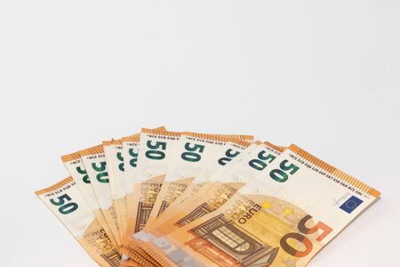 Some 50 euro banknotes isolated on white background
