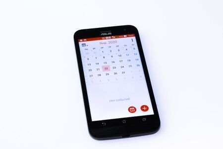 Kouvola, Finland - 23 January 2020: Calendar app on the screen of smartphone Asusのeditorial素材