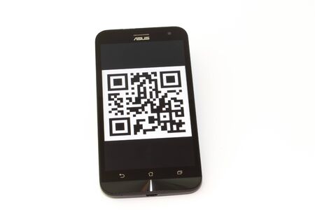 Kouvola, Finland - 23 January 2020: QR code on the screen of smartphone Asus.のeditorial素材