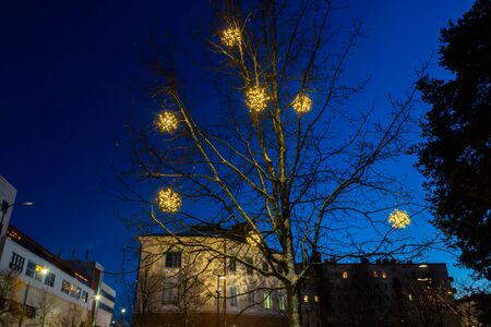 Kouvola, Finland - 30 November 2019: Christmas decorations in the central park of Kouvola with evening light illumination.のeditorial素材