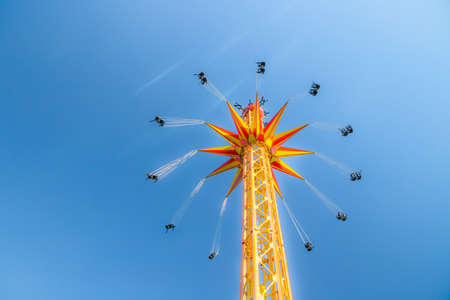 Kouvola, Finland - 18 May 2019: Ride Star Flyer in motion on sky background in amusement park Tykkimakiのeditorial素材