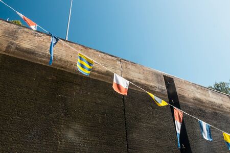 Nautical flags on the ship in the lock