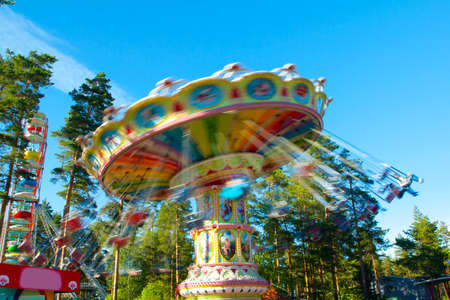 Kouvola, Finland 1 July 2015 - Ride Swing Carousel in motion in amusement park Tykkimakiのeditorial素材