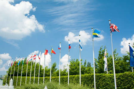 BRUSSELS, BELGIUM - 13 MAY 2016: Miniatures at the park Mini-Europe - reproductions of monuments in the European Union at a scale of 1:25. Flags of the European Unionのeditorial素材