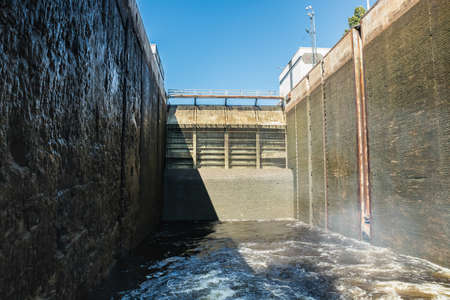 Lappeenranta, Finland - August 7, 2019: Lock on the Saimaa Canal at Malkia. View from water.のeditorial素材