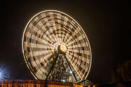 HELSINKI, FINLAND -OCTOBER 12, 2018: The Carnival of Light event at the Linnanmaki amusement park in Helsinki, Finland. Ride Ferris Wheel Rinkeli.のeditorial素材