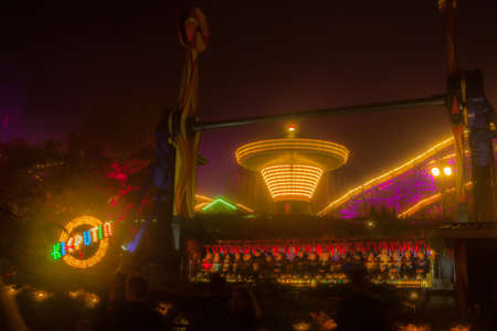 HELSINKI, FINLAND -OCTOBER 12, 2018: The Carnival of Light event at the Linnanmaki amusement park in Helsinki, Finland. Rides chain carousel Ketjukaruselli and Kieputinのeditorial素材