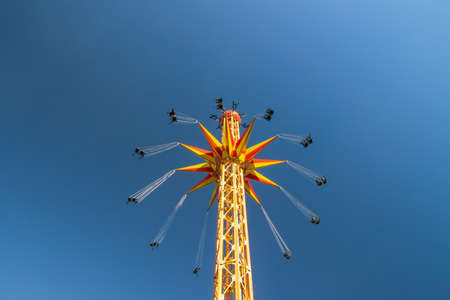 Kouvola, Finland - 18 May 2019: Ride Star Flyer in motion on sky background in amusement park Tykkimakiのeditorial素材