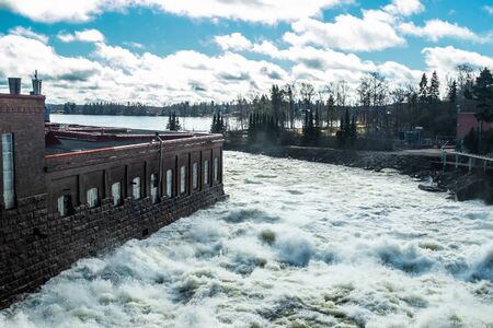 Hydroelectric power generation plant and Ankkapurha Industrial Museum at Kymijoki river, Finland.の写真素材