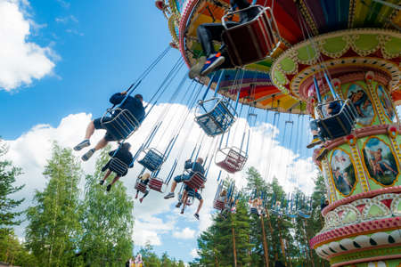 Kouvola, Finland - 14 July 2020: Ride Swing Carousel in amusement park Tykkimaki at summer sunny dayのeditorial素材