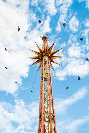 Kouvola, Finland - 14 July 2020: Ride Star Flyer in motion in amusement park Tykkimaki at summer sunny dayのeditorial素材
