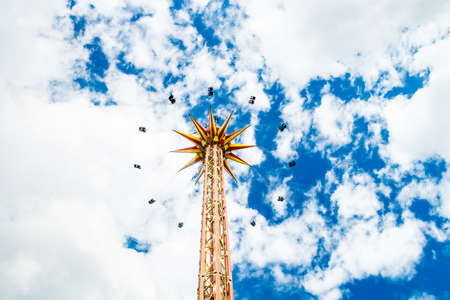 Kouvola, Finland - 14 July 2020: Ride Star Flyer in motion in amusement park Tykkimaki at summer sunny dayのeditorial素材