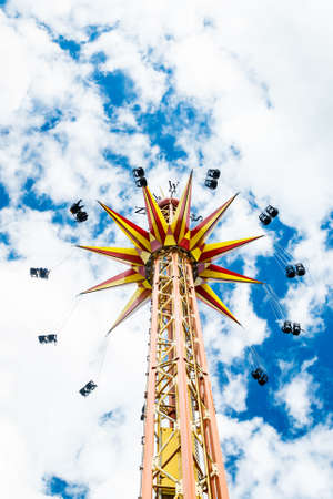 Kouvola, Finland - 14 July 2020: Ride Star Flyer in motion in amusement park Tykkimaki at summer sunny dayのeditorial素材