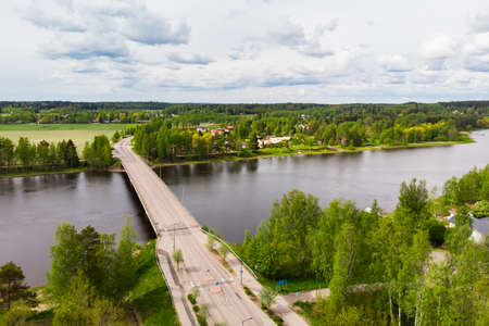 Aerial panoramic view of bridge in city Inkeroinen at river Kymijoki, Finland.の写真素材
