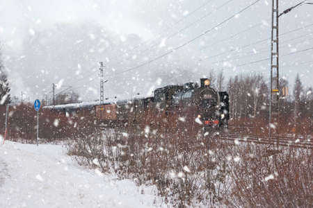 KOUVOLA, FINLAND - DECEMBER 26, 2018: Steam train Ukko-Pekka going from Kouvola to Kotka. The steam locomotive Hr1 1009 was made in 1948 and restored in 1993.のeditorial素材