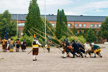 Kouvola, Finland - 7 August 2021: Outdoor performance at the Medieval Market Festival. Soldiers of...
