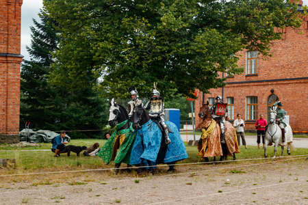 Kouvola, Finland - 7 August 2021: Outdoor performance at the Medieval Market Festival. Knights on horseback.のeditorial素材